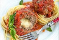 Cheesy Mozzarella-Stuffed Meatballs with Tomato Sauce