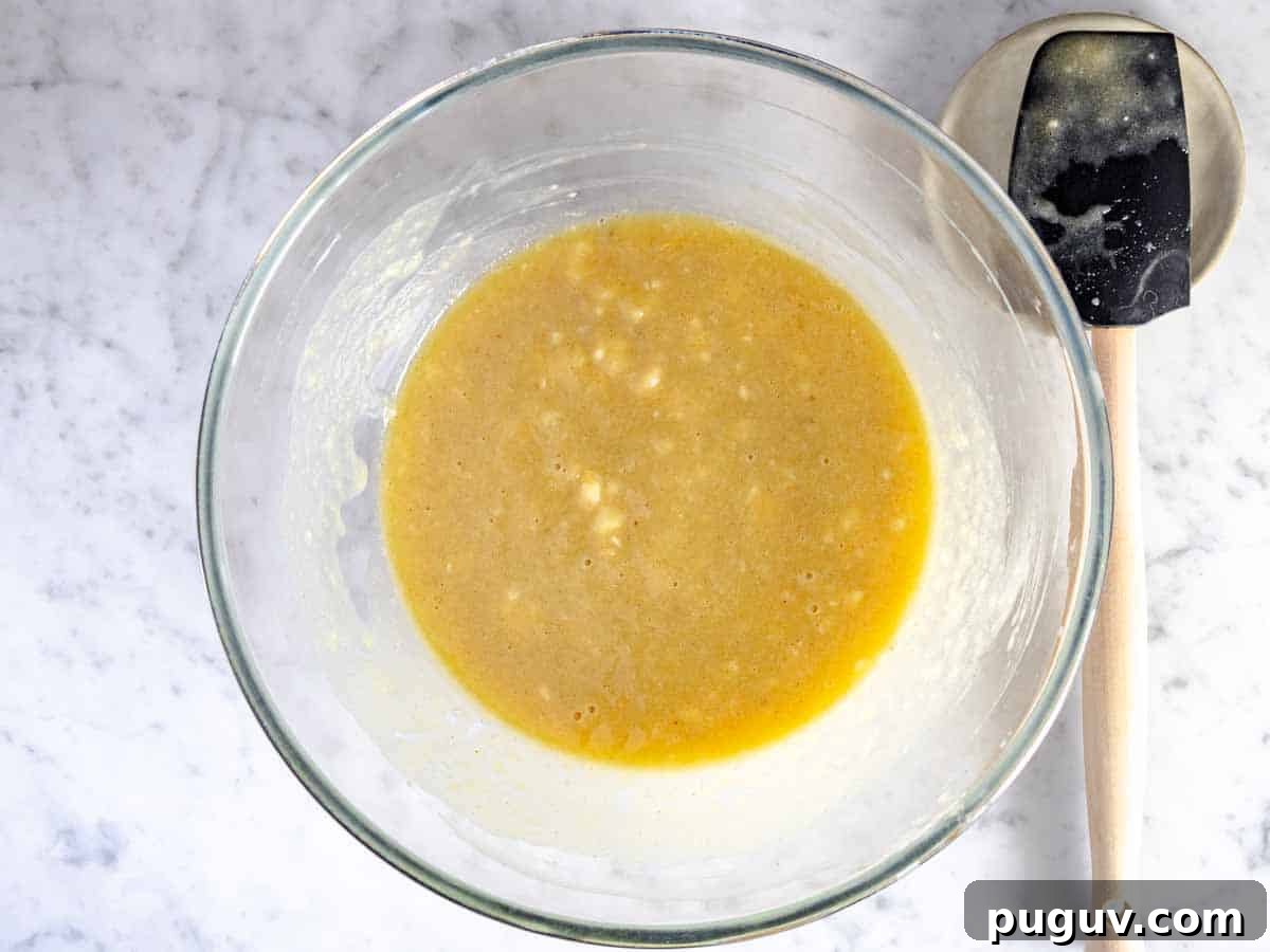 Moist Banana Bread Recipe with Whole Grain and Yogurt 6 wet ingredients in a bowl
