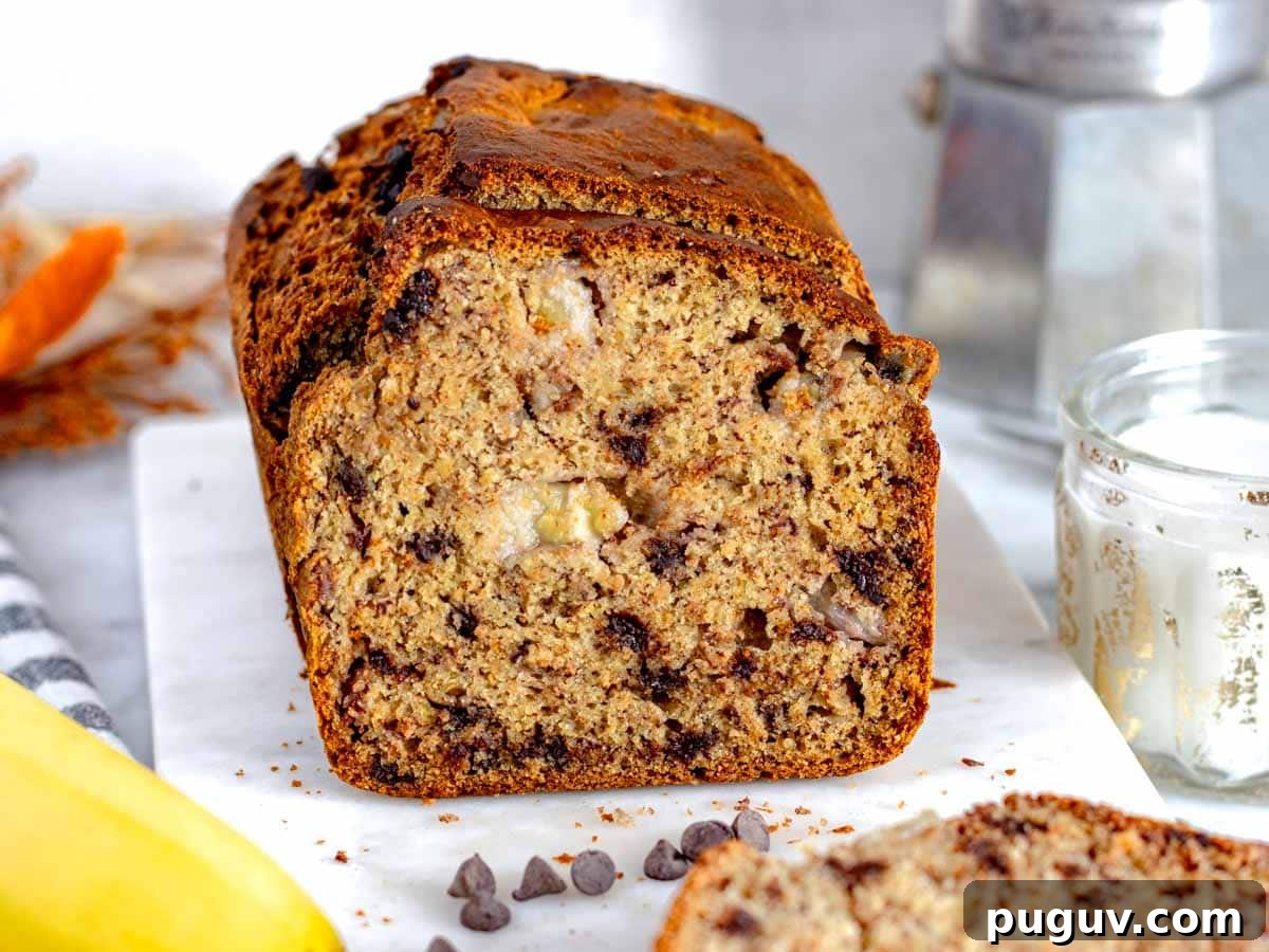 Moist Banana Bread Recipe with Whole Grain and Yogurt 10 Healthy banana bread on a cutting board
