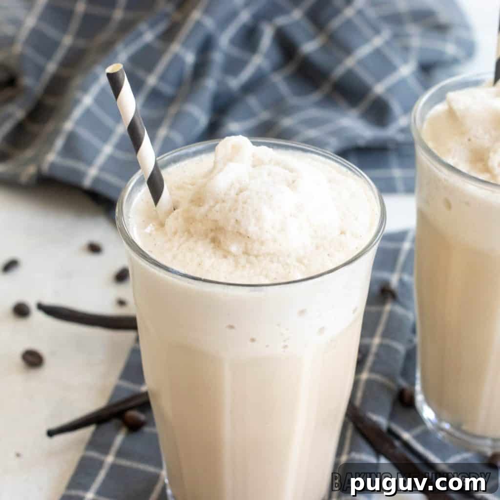 Copycat Vanilla Coffee Frappuccino Recipe for Cafe-Style Blended Drink 2 vanilla coffee frappuccino recipe in two glasses from side