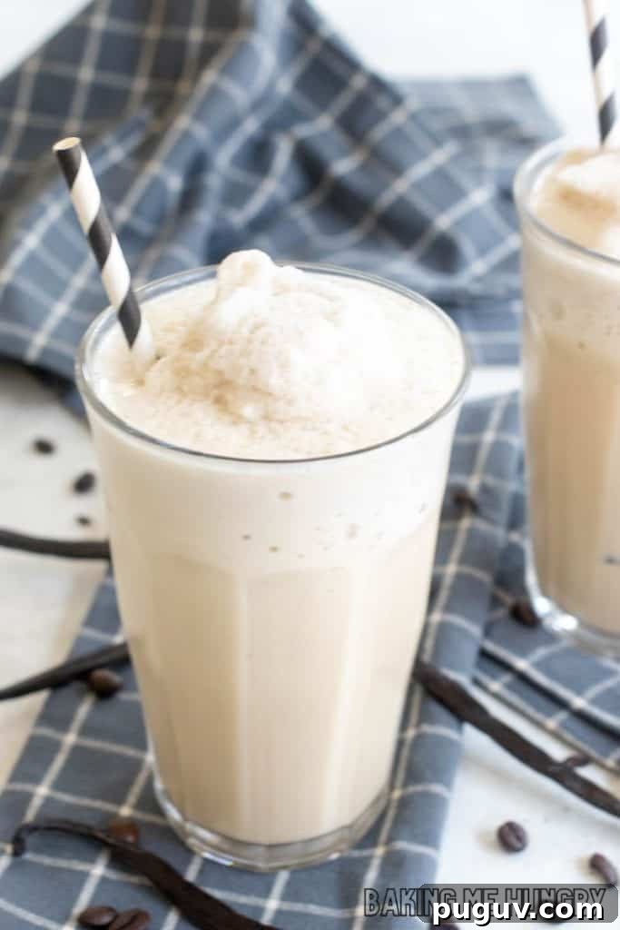 Copycat Vanilla Coffee Frappuccino Recipe for Cafe-Style Blended Drink 7 vanilla coffee frappuccino recipe in tall glass with black and white straw