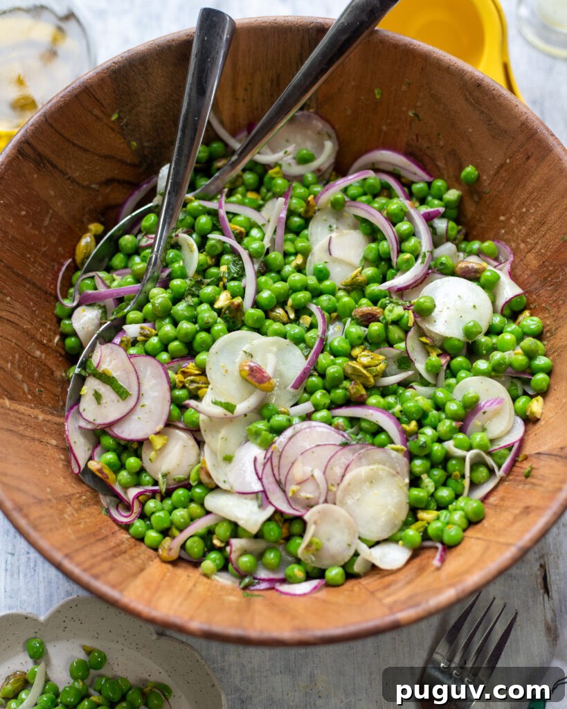 Minted Pea and Radish Salad with Lemon Vinaigrette 3 big wood bowl filled with healthy pea salad with radishes, red onions, mint and pistachios