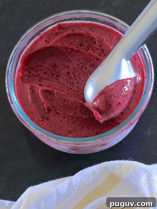 Scooping Creamy Sorbet from a clear glass bowl