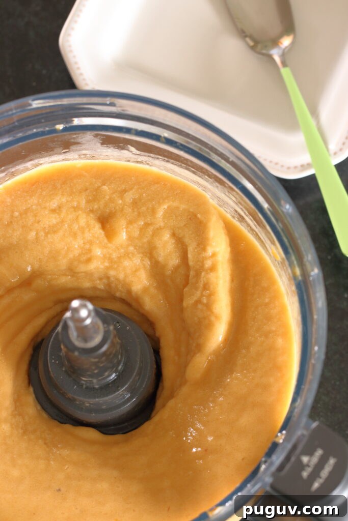 Frozen peaches blended in food processor with frozen banana and a splash of honey simple syrup ready to serve
