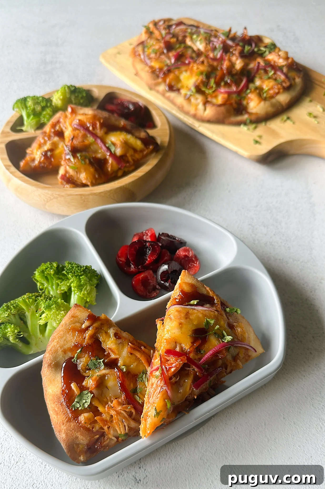 BBQ Chicken Naan Pizza Recipe: Crispy Naan, Tangy Sauce 7 BBQ chicken naan pizzas served with broccoli and cherries.
