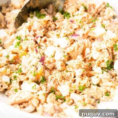 This canned salmon salad recipe is done in 10 minutes. It is so easy to make and you can serve it on toast, crackers or bread. Try this salmon salad!