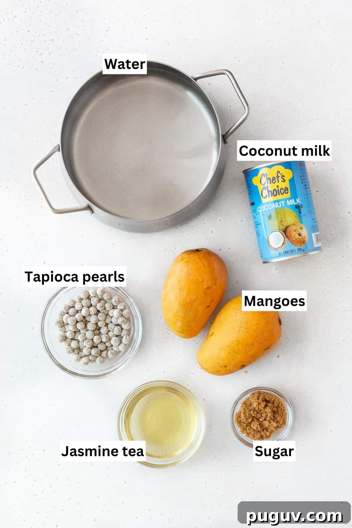 All of the ingredients for mango boba tea on the counter.