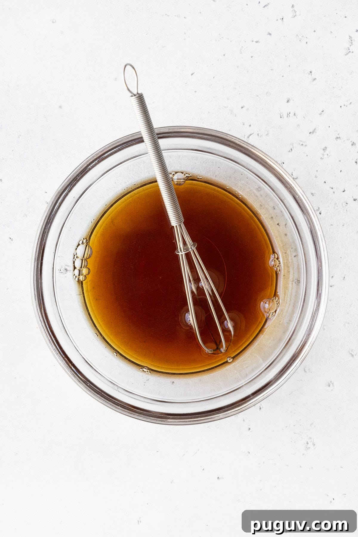 Mixing the brown sugar and hot water together in a small bowl.