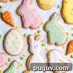 Easter Sugar Cookie Recipe with Simple Decorative Icing 14 overhead close up of cookies in shapes of bunnies and eggs