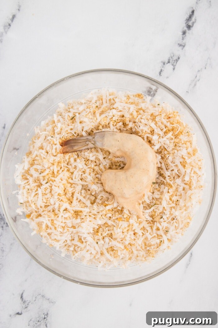 A shrimp in a bowl of coconut flakes