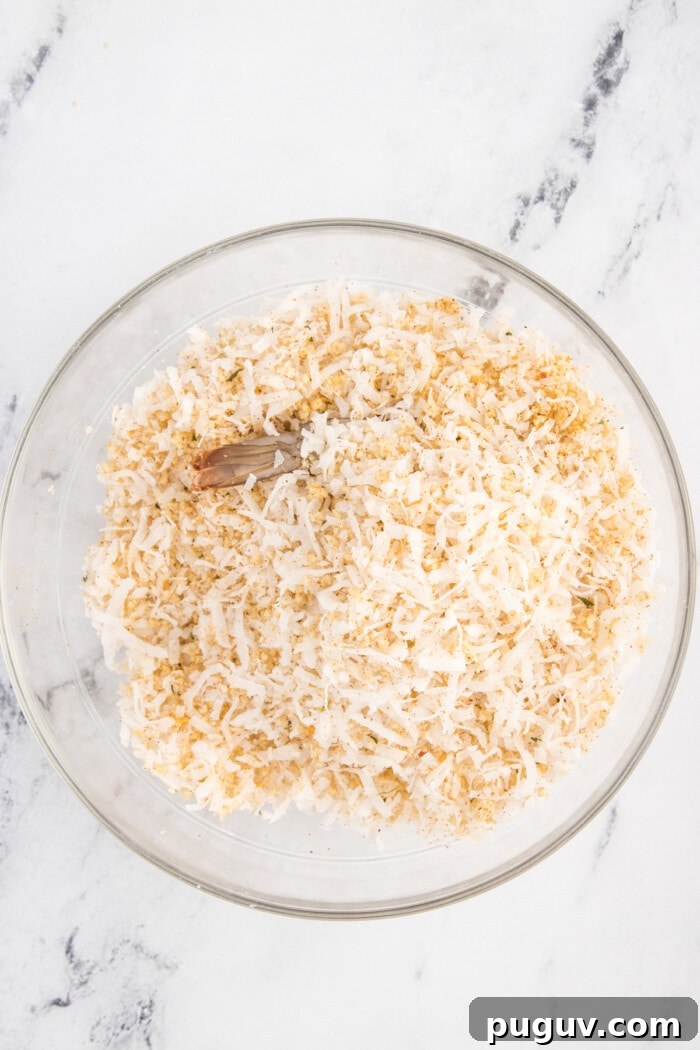 A shrimp in a bowl of coconut flakes