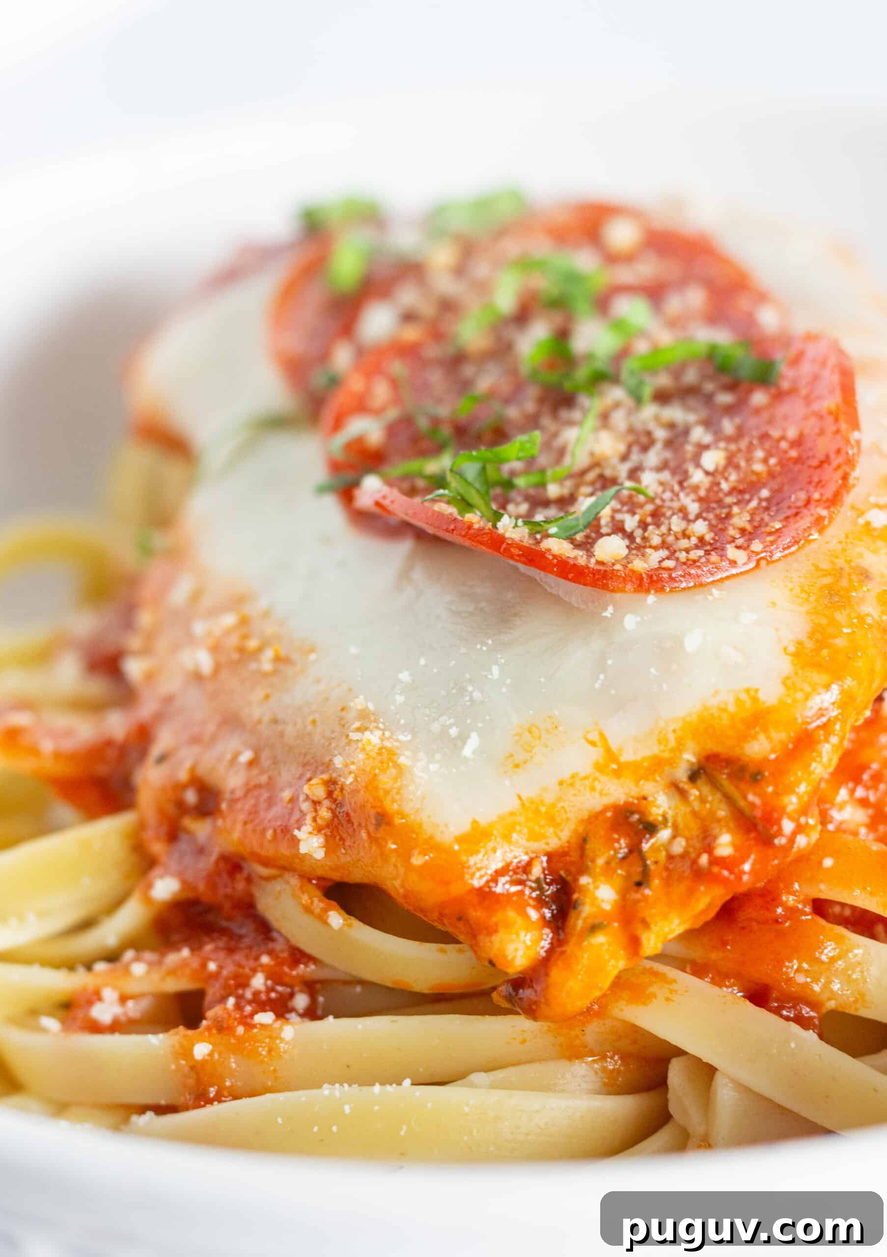 Pepperoni Pizza Chicken Skillet: One-Pan Family Dinner 6 Pepperoni pizza skillet on a bed of pasta.