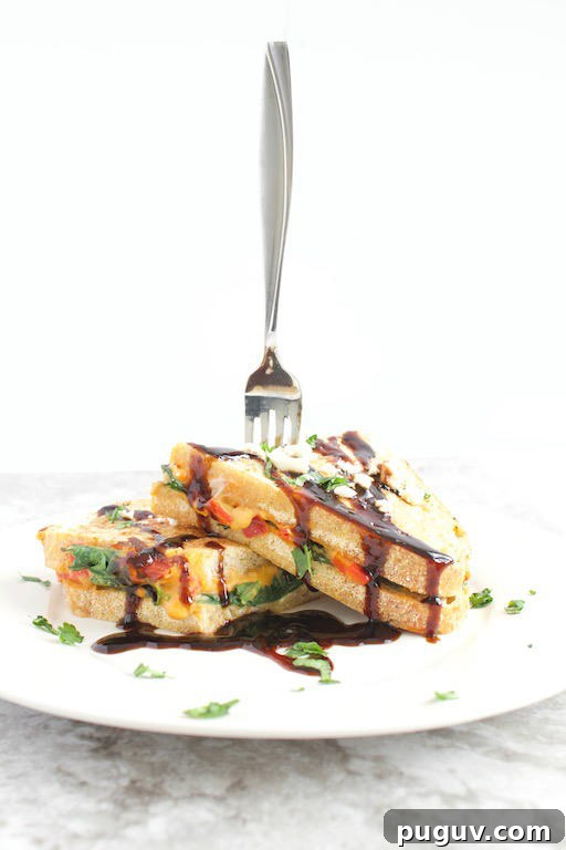 Savory Stuffed French Toast Recipe: Creamy Herb & Cheese Filling 3 Savory French Toast Recipe on Plate Stabbed with Fork