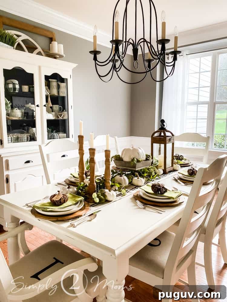 13 Stunning Ways to Add Fall Color to Your Home 9 fall tablescape with green napkins and pumpkins