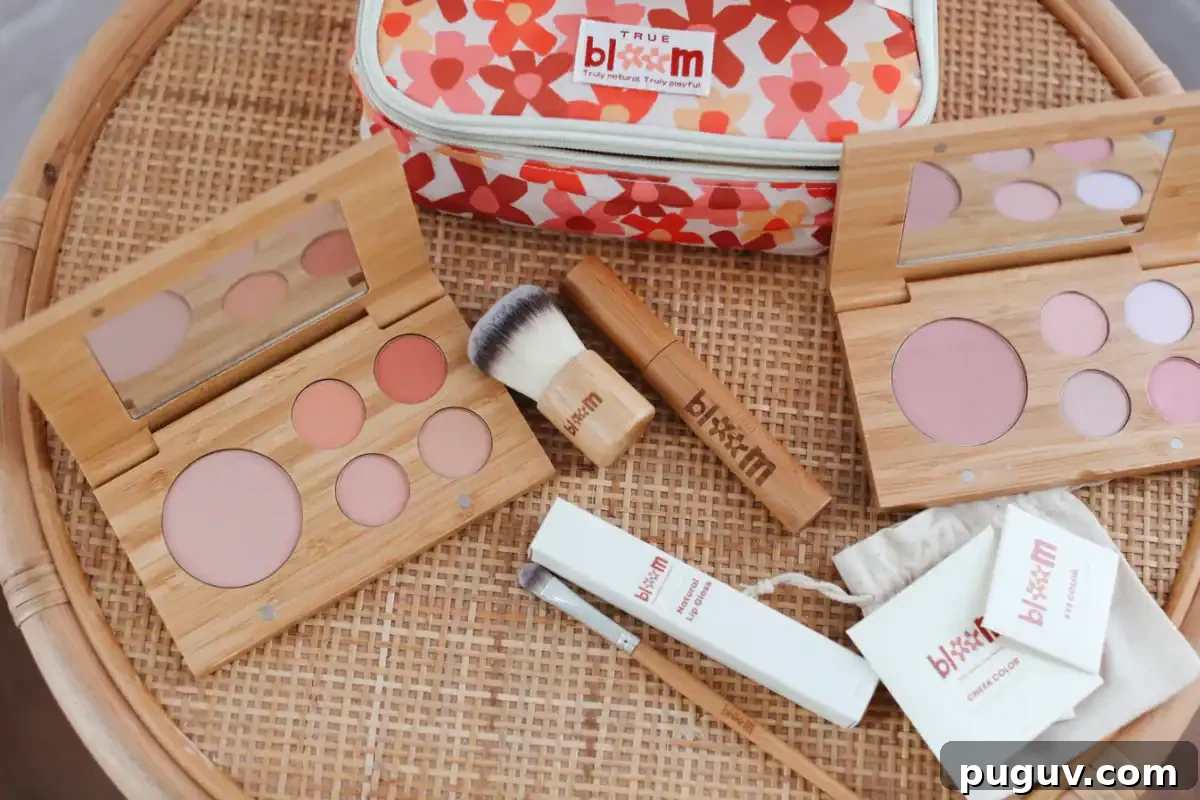 Clean Makeup for Tweens: 8 Safe Brands for Kids and Teens 3 A flat lay shows a natural makeup set from the True Bloom brand, featuring two wooden palette compacts, a brush, lip gloss, and a floral-patterned cosmetics bag on a woven rattan surface.
