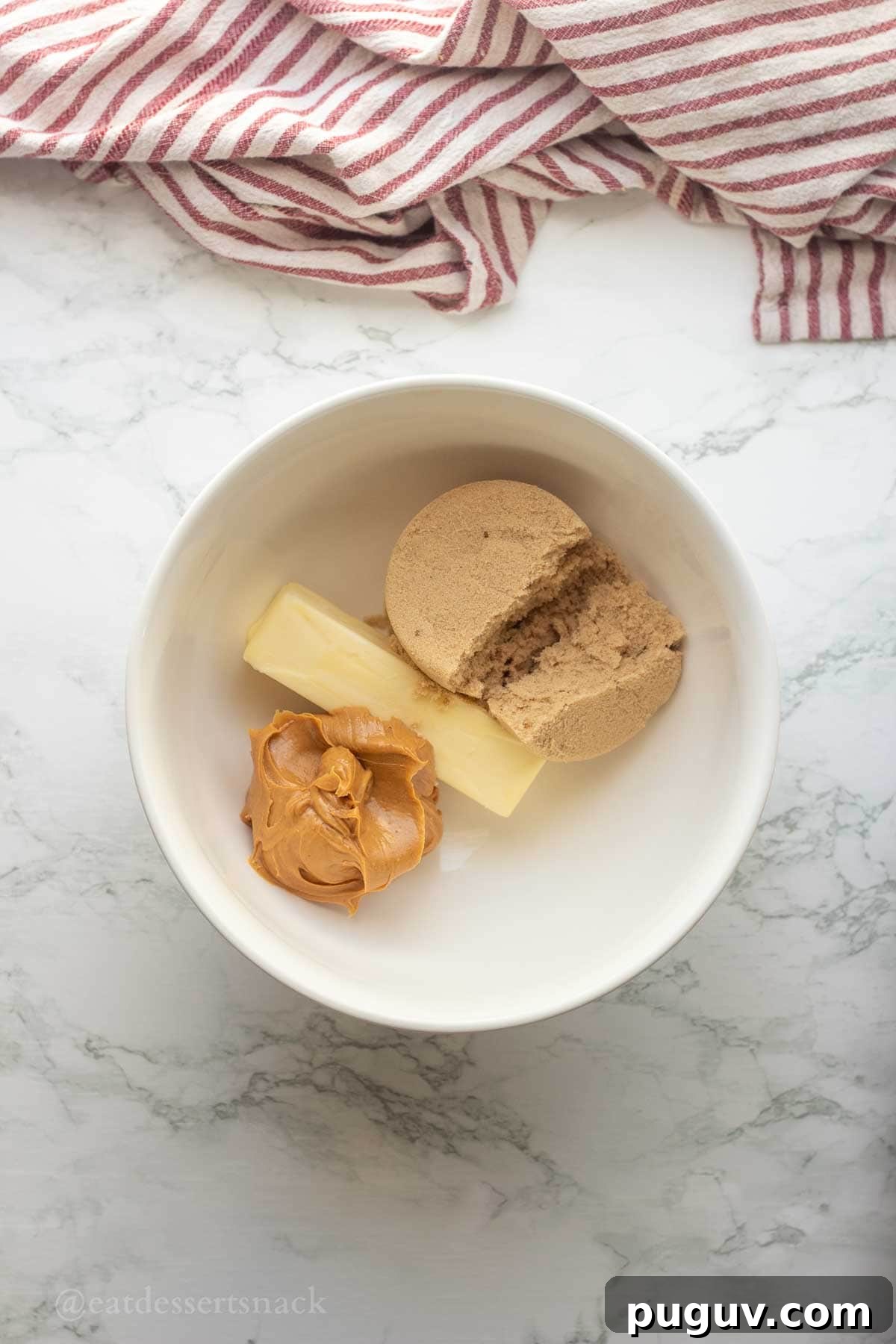 Brown sugar, peanut butter, and butter in mixing bowl.