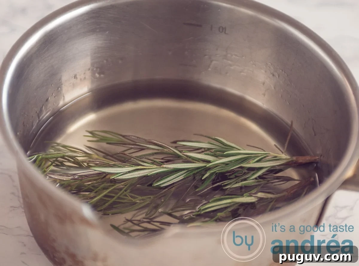 rosemary in a pan with sugar water