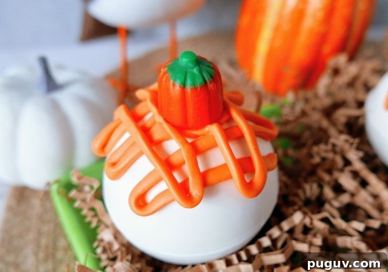 Pumpkin Spice Hot Chocolate Bombs Recipe for Cozy Fall Drinks 2 view from side of pumpkin hot chocolate bomb
