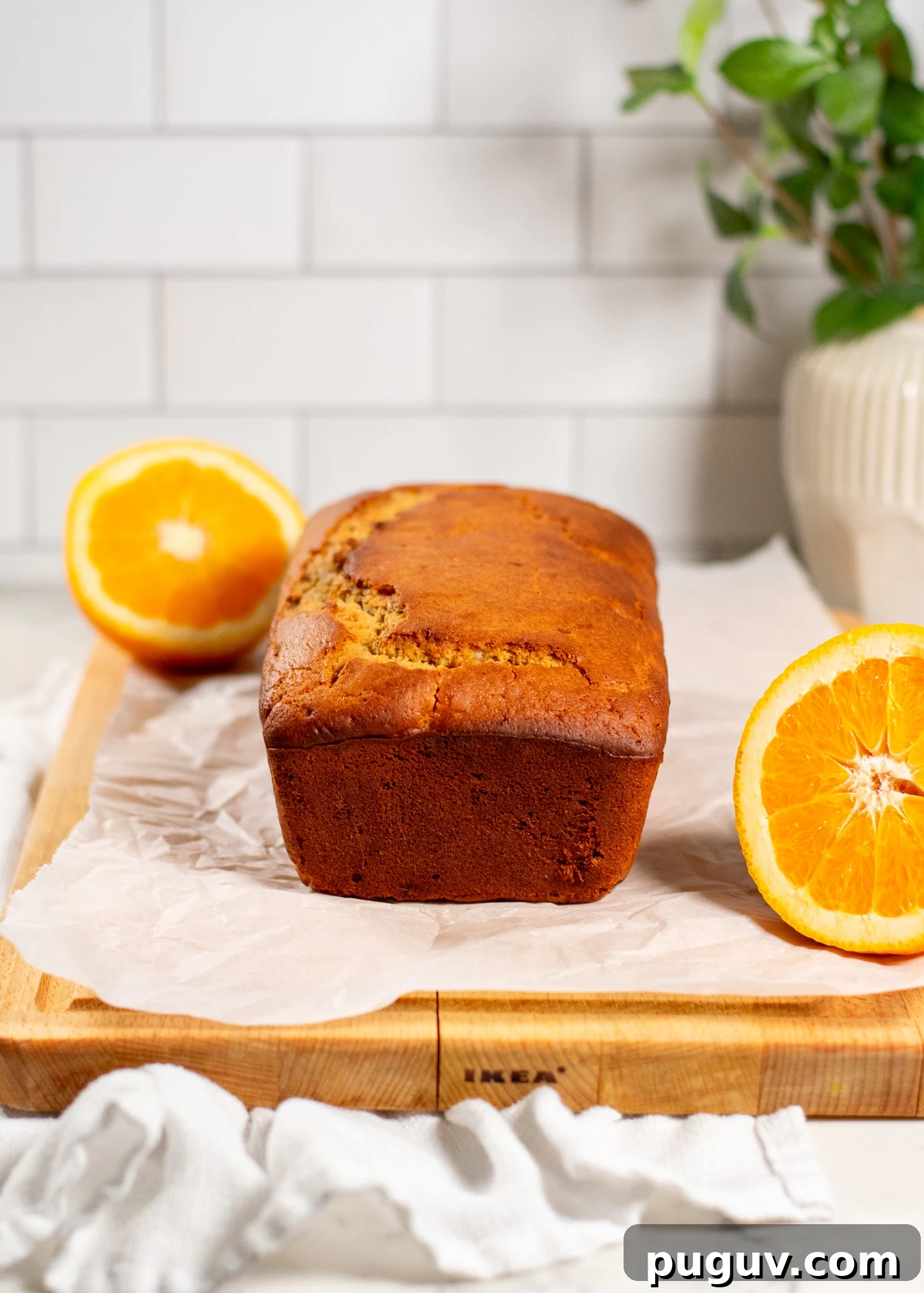A christmas loaf cake with raisins and orange peel.