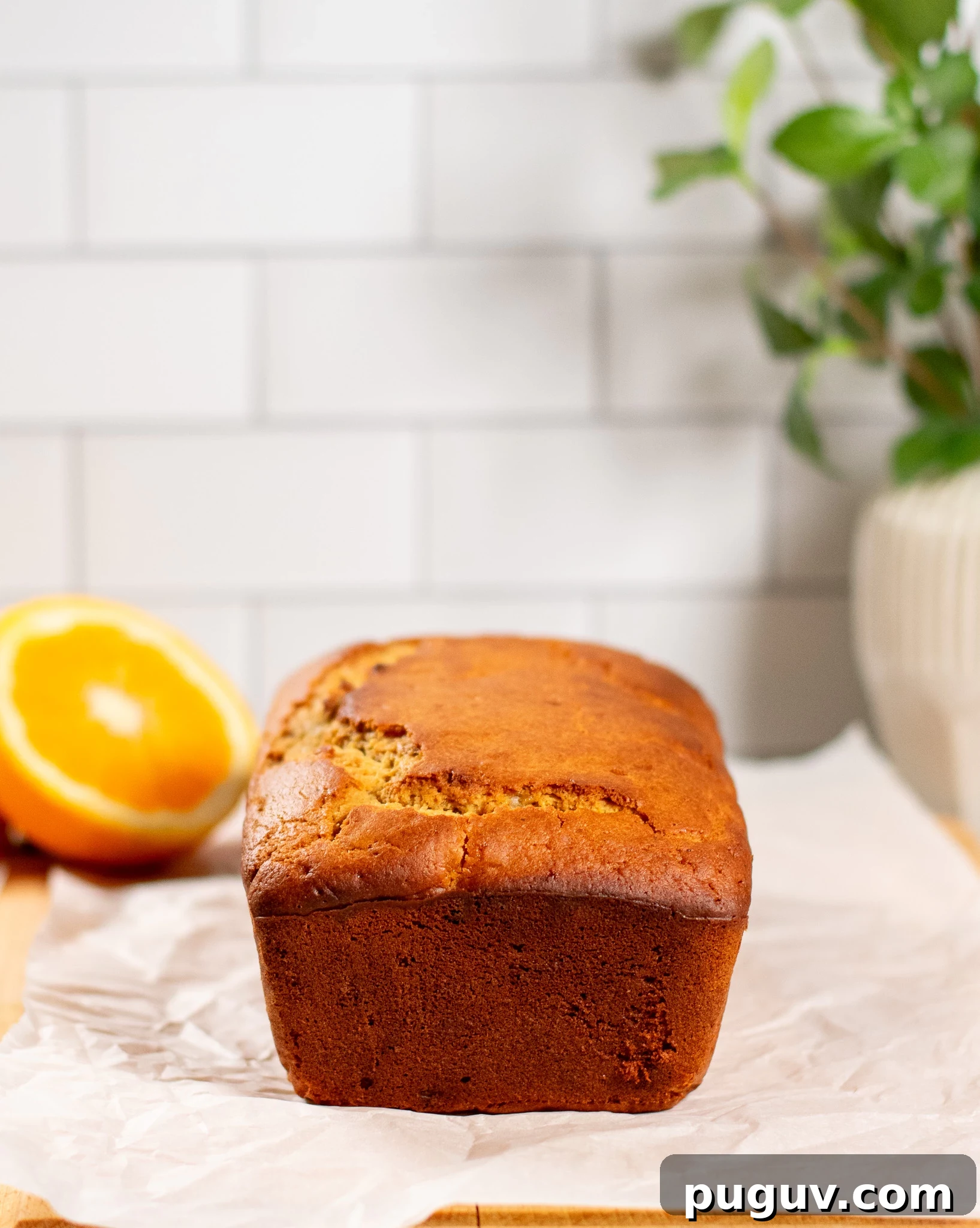 A christmas loaf cake with raisins and orange peel.