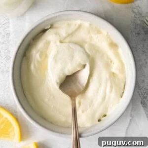 Homemade mascarpone cheese in a bowl.