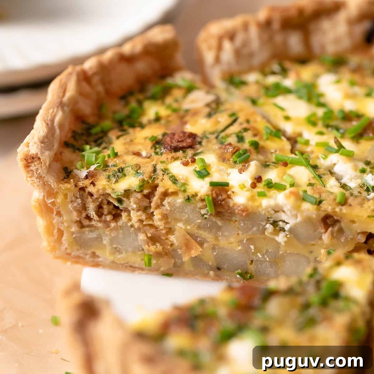 puff pastry quiche cut into slices.