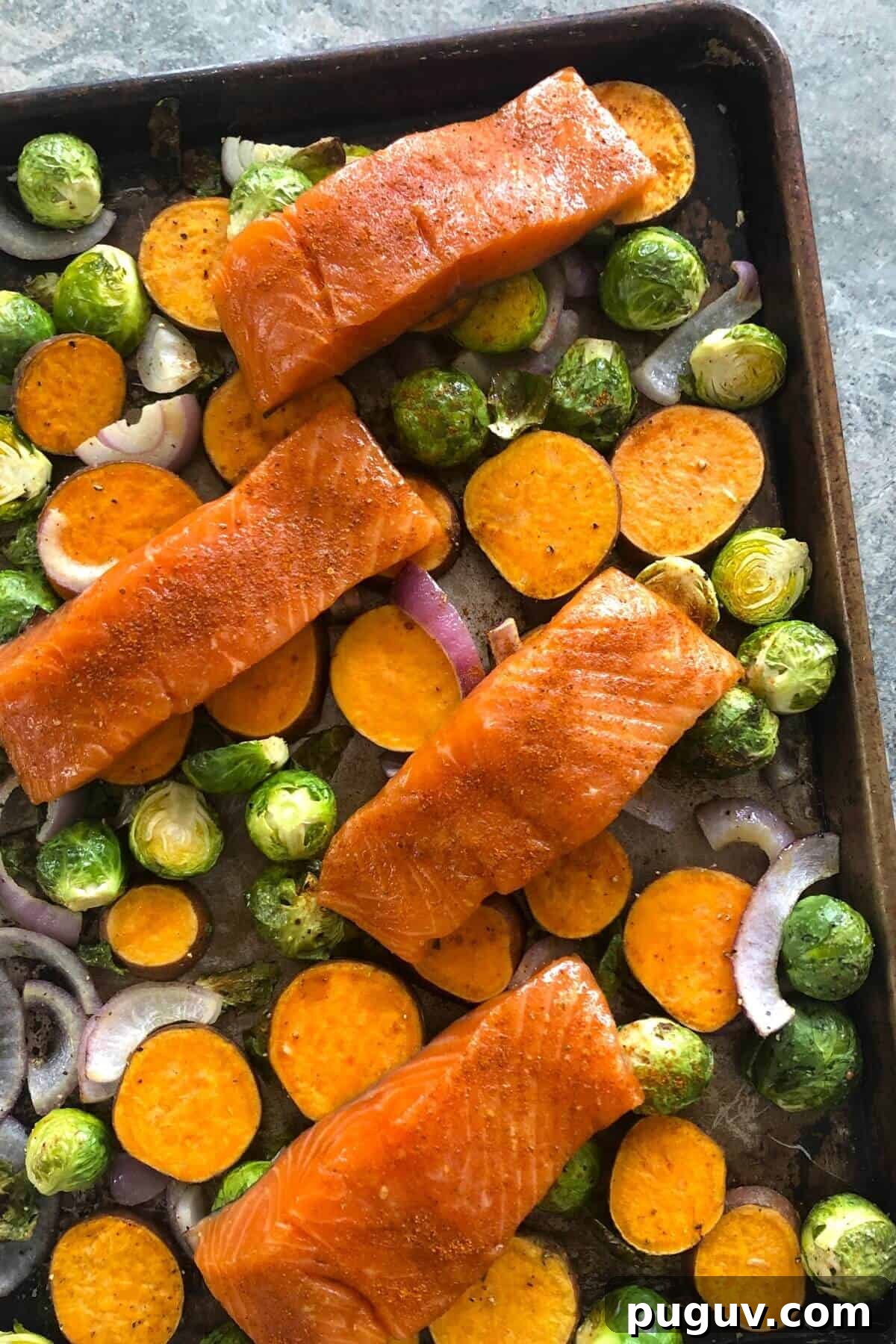 uncooked salmon sheet pan dinner.