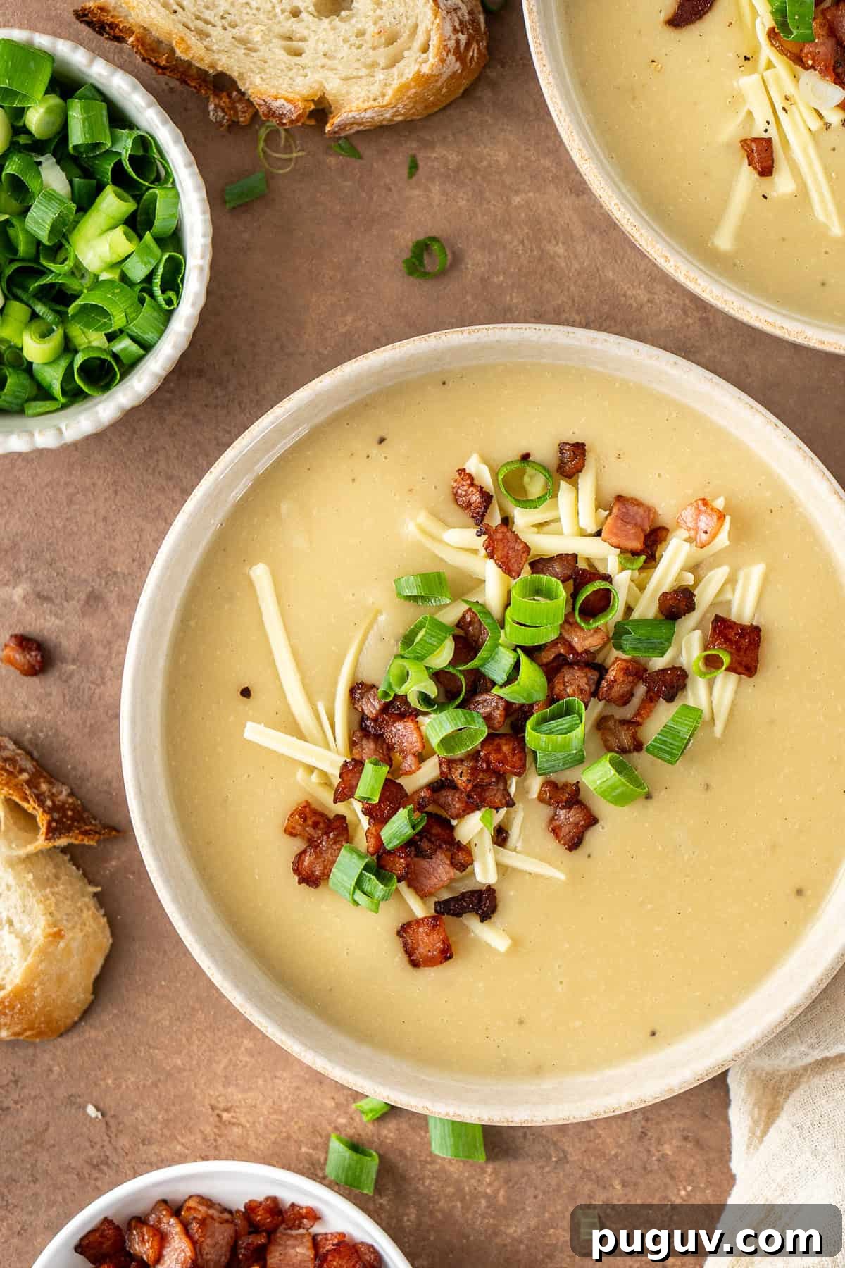 Creamy Dairy-Free Baked Potato Soup Recipe 4 Close up of the baked potato soup with loaded toppings.