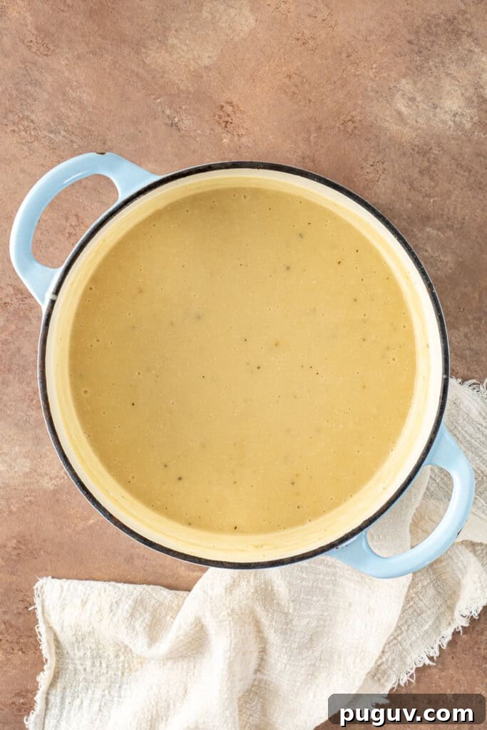 Creamy Dairy-Free Baked Potato Soup Recipe 9 The finished blended potato soup in the pot.