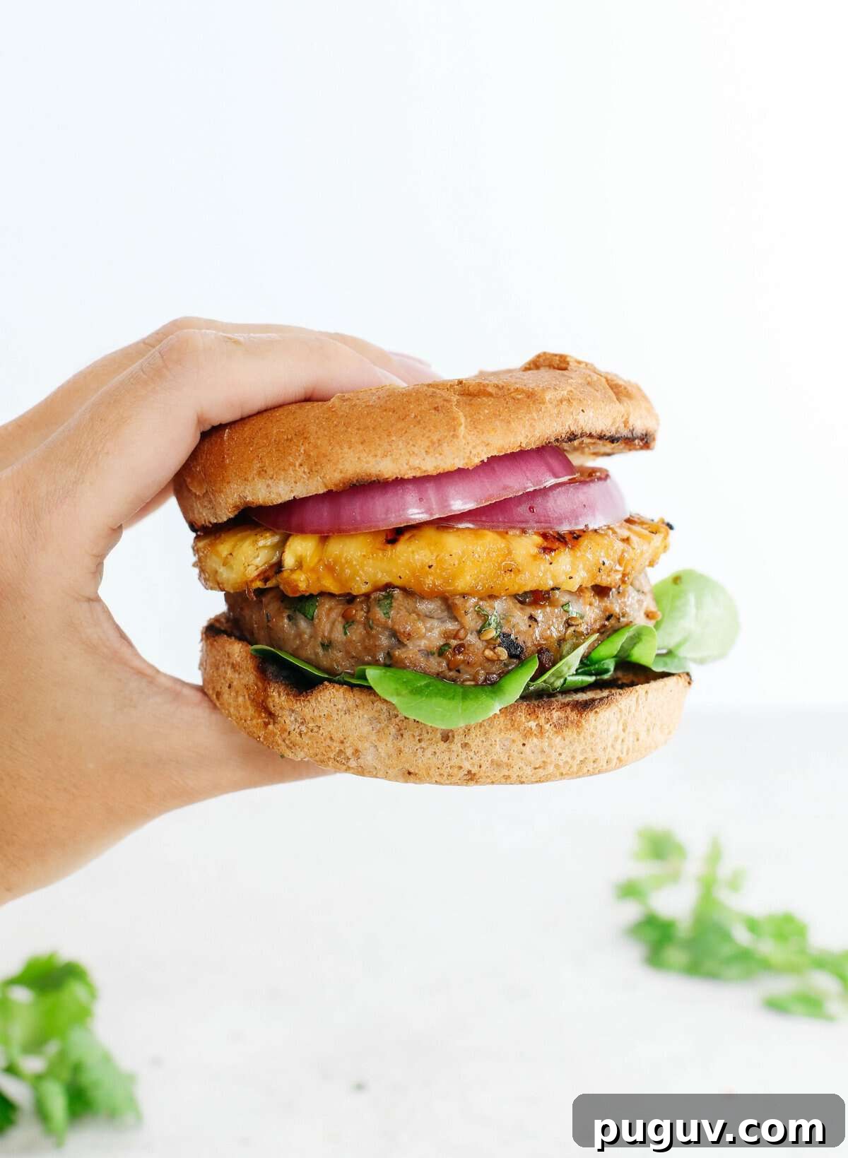 These delicious Hawaiian Turkey Burgers are packed with tons of flavor, made with a healthy homemade teriyaki sauce and topped with fresh grilled pineapple!