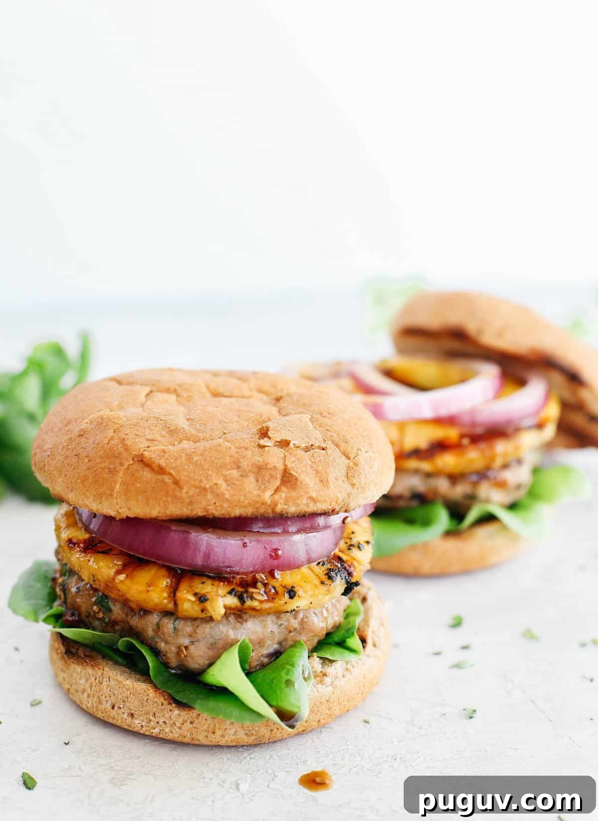 These delicious Hawaiian Turkey Burgers are packed with tons of flavor, made with a healthy homemade teriyaki sauce and topped with fresh grilled pineapple!