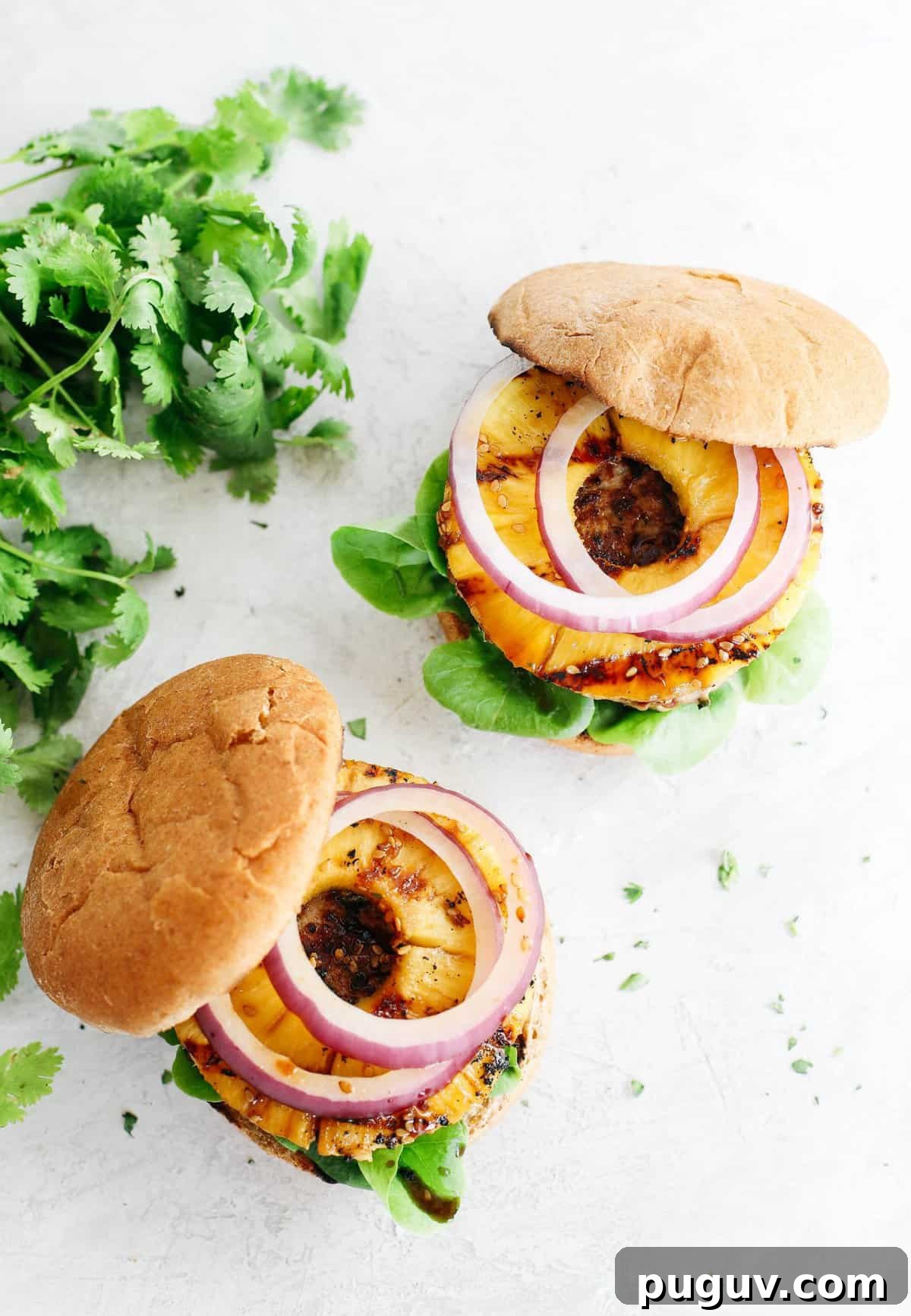 These delicious Hawaiian Turkey Burgers are packed with tons of flavor, made with a healthy homemade teriyaki sauce and topped with fresh grilled pineapple!