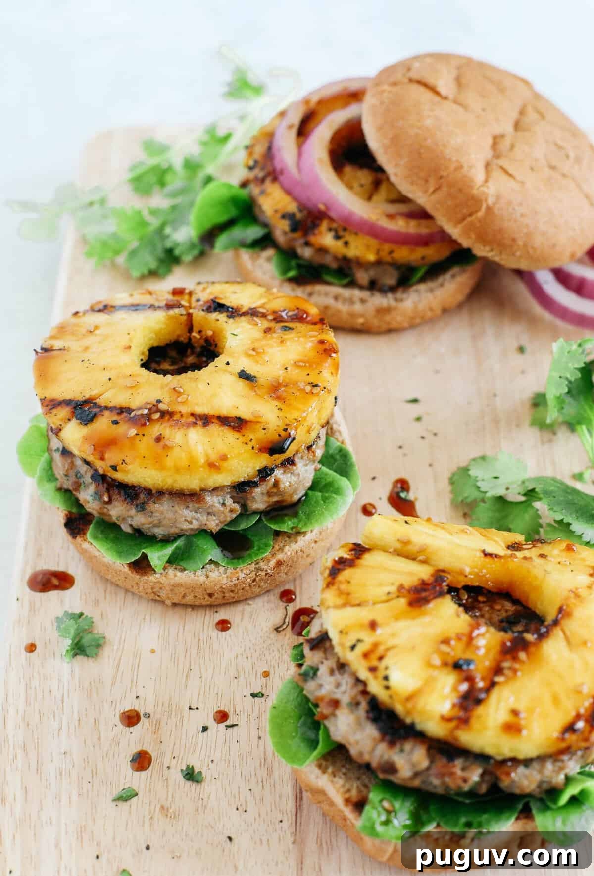 These delicious Hawaiian Turkey Burgers are packed with tons of flavor, made with a healthy homemade teriyaki sauce and topped with fresh grilled pineapple!