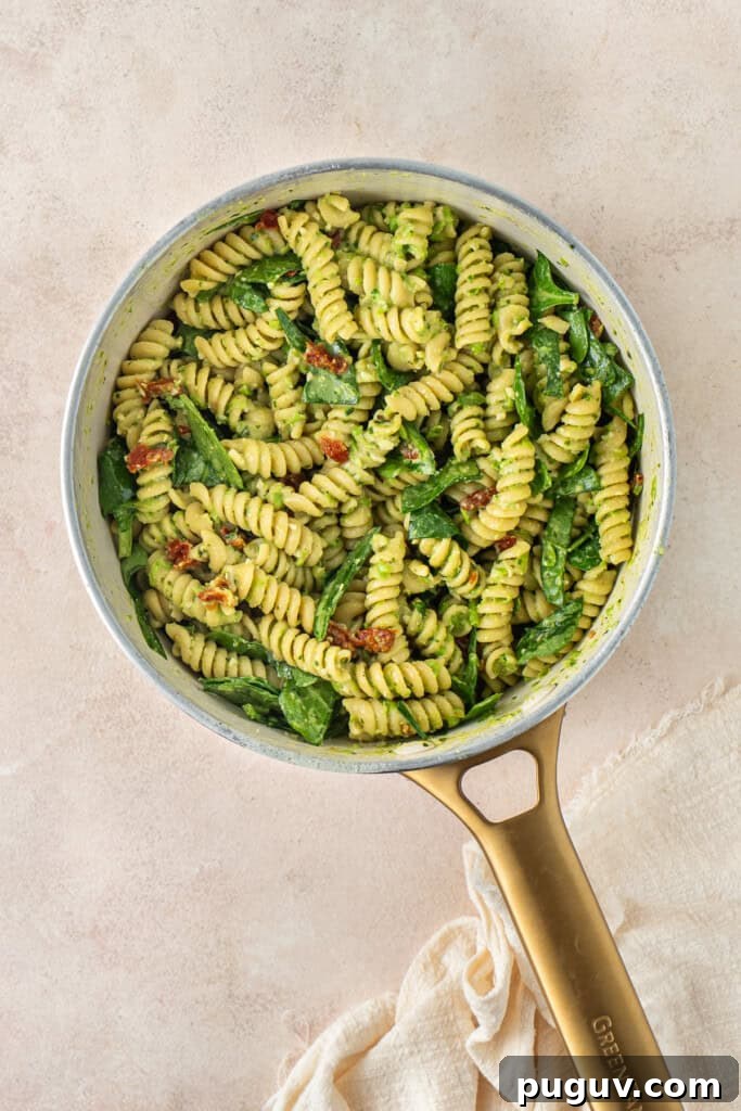 The finished pasta mixed in a pot.