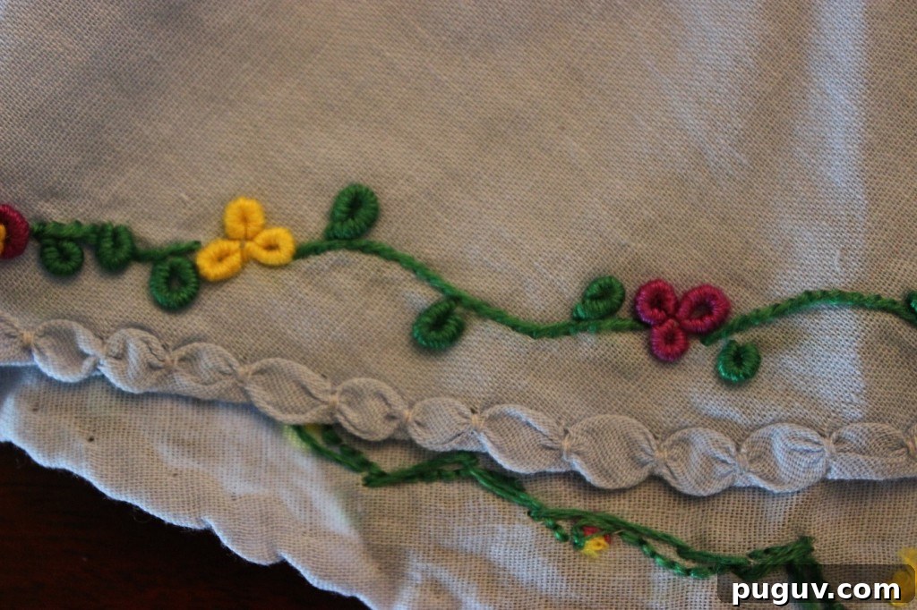 intricate embroidered infant dress. Fair Trade’s Direct Community Benefit