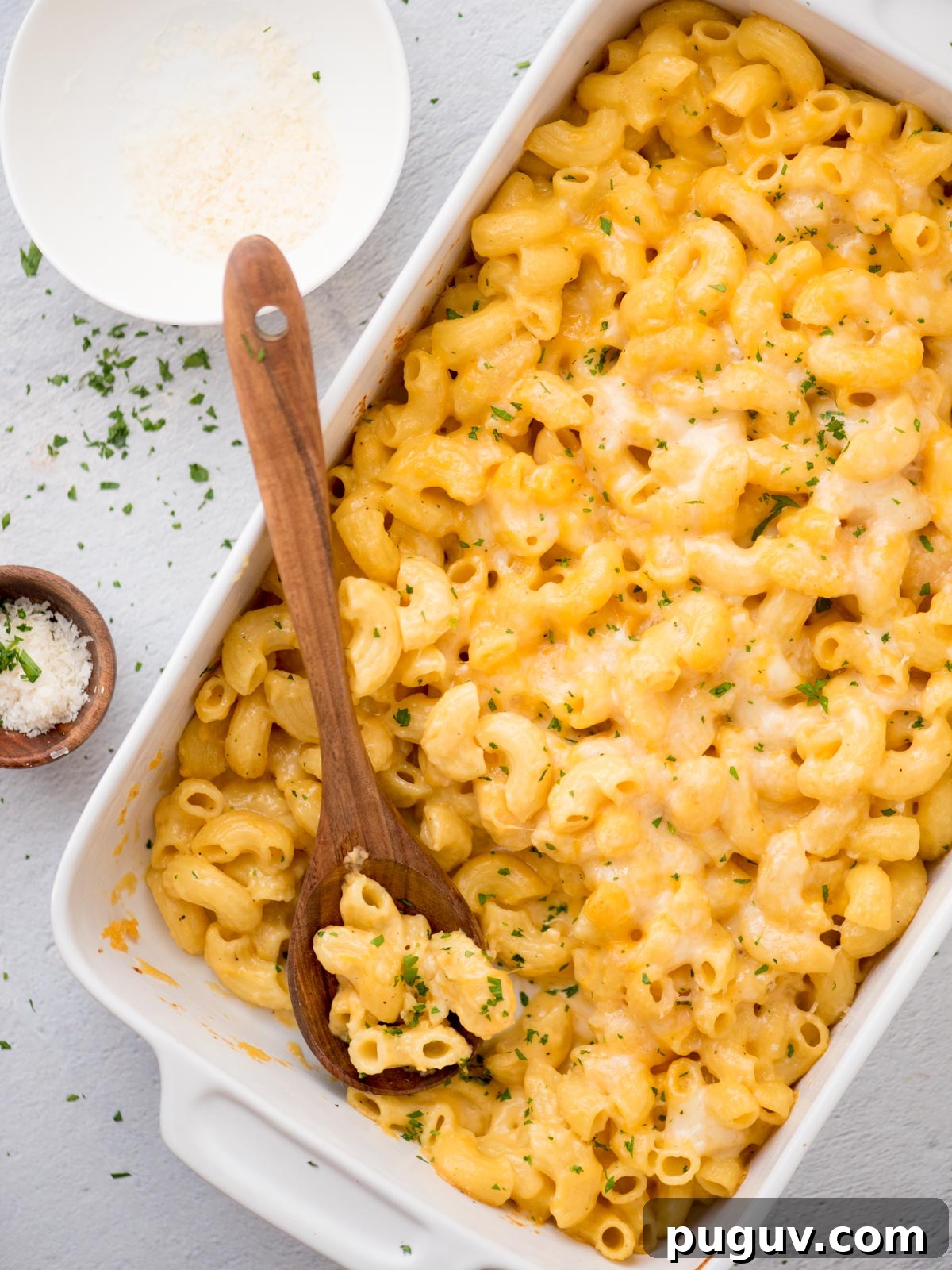 Creamy Baked Macaroni and Cheese Casserole 2 Top view of a baking dish of baked mac and cheese.