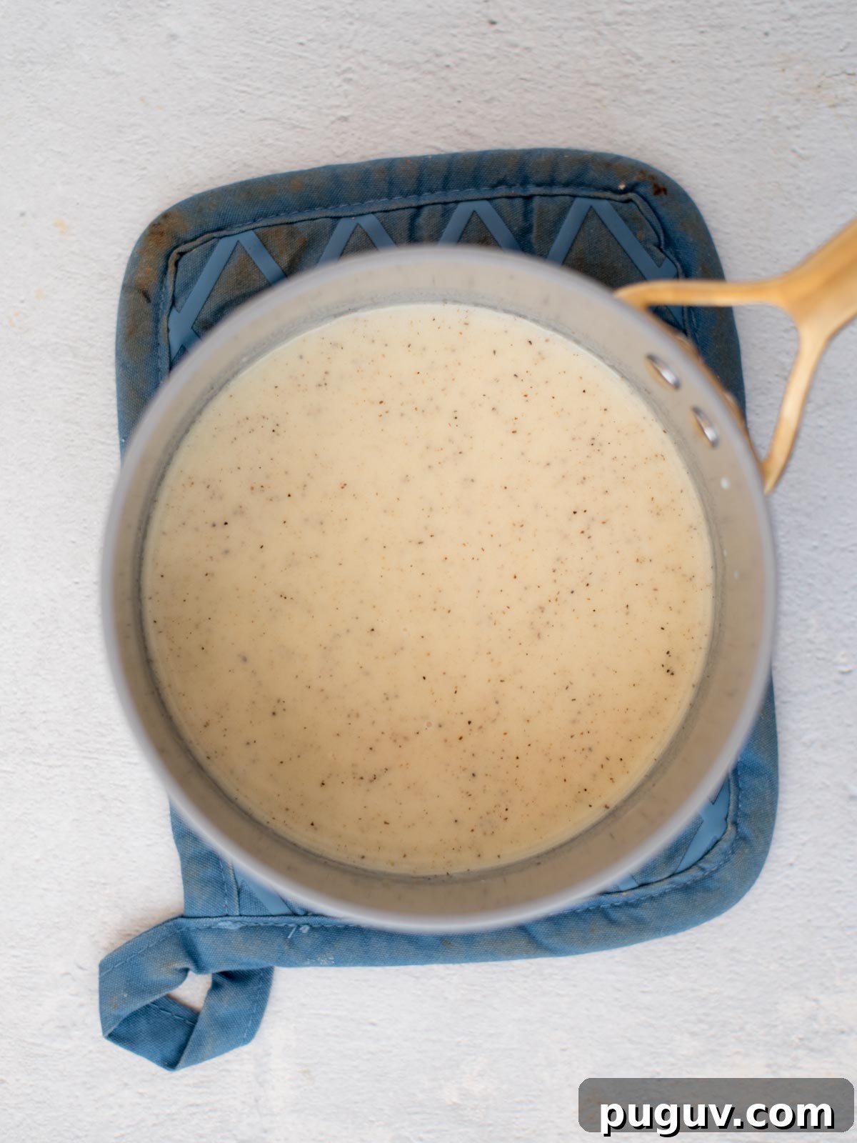 Creamy Baked Macaroni and Cheese Casserole 4 Roux in a saucepan.