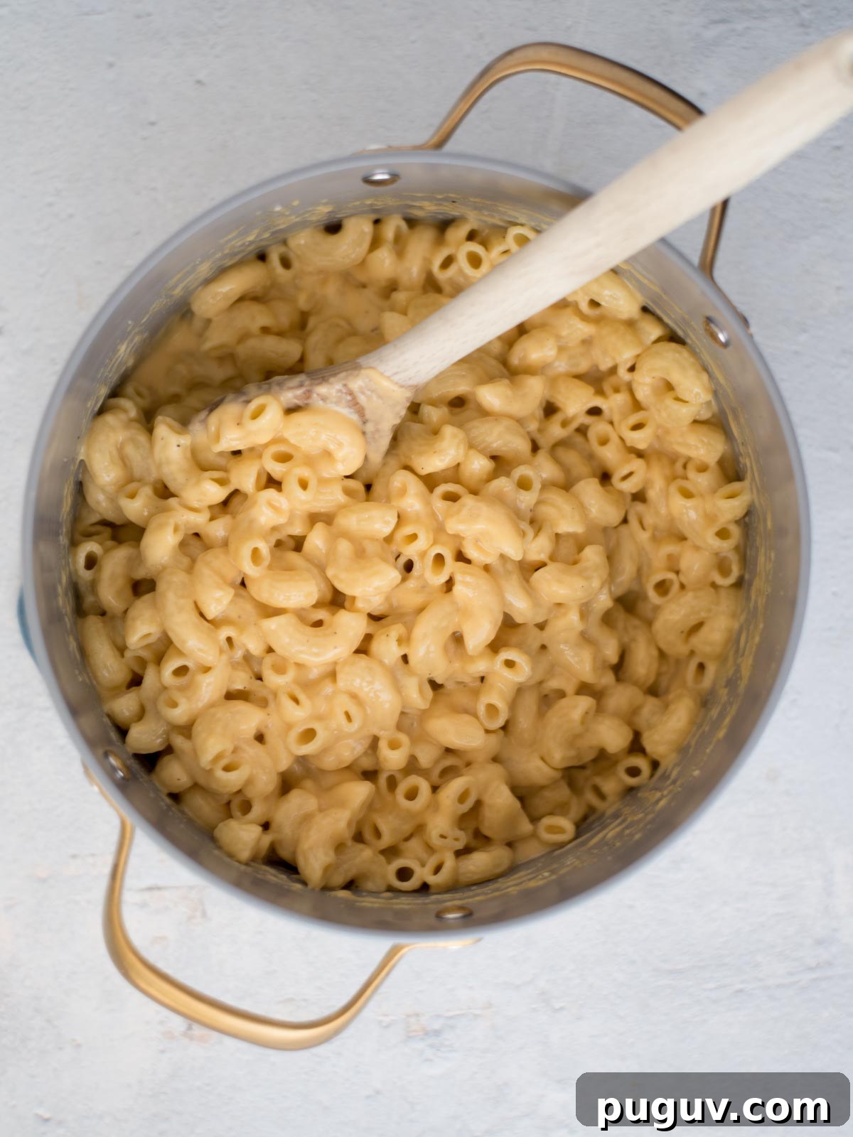 Creamy Baked Macaroni and Cheese Casserole 9 Mac and cheese in a saucepan.