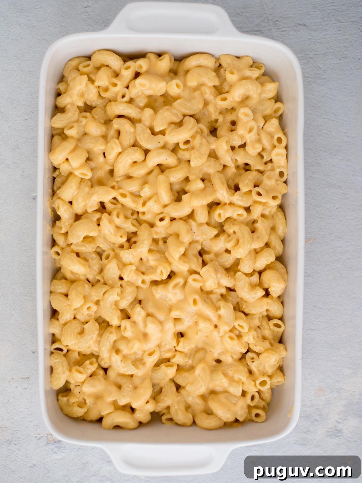 Creamy Baked Macaroni and Cheese Casserole 10 Mac and cheese placed in a baking dish.