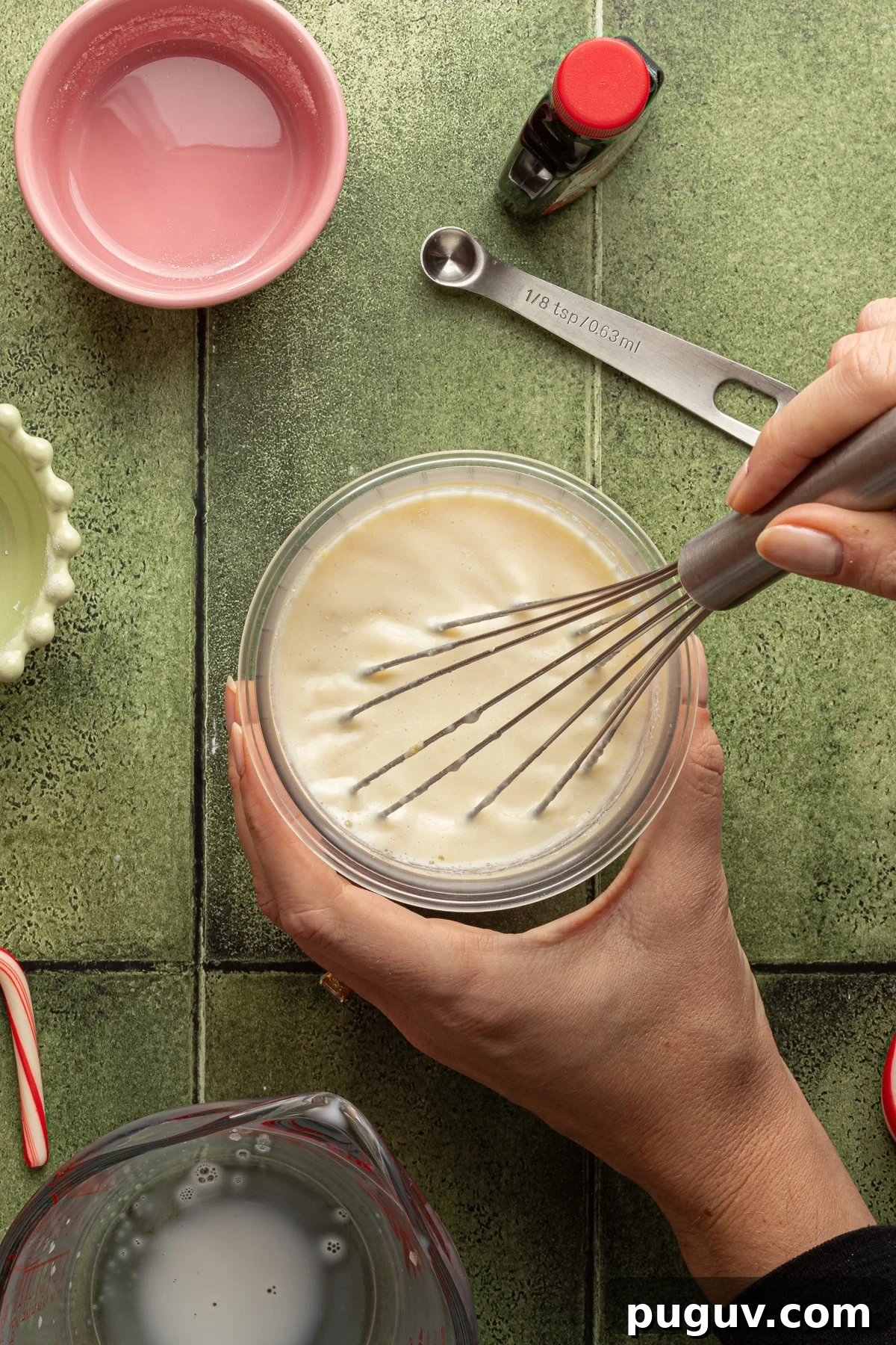 Ninja Creami peppermint ice cream ingredients being whisked in the pint container.