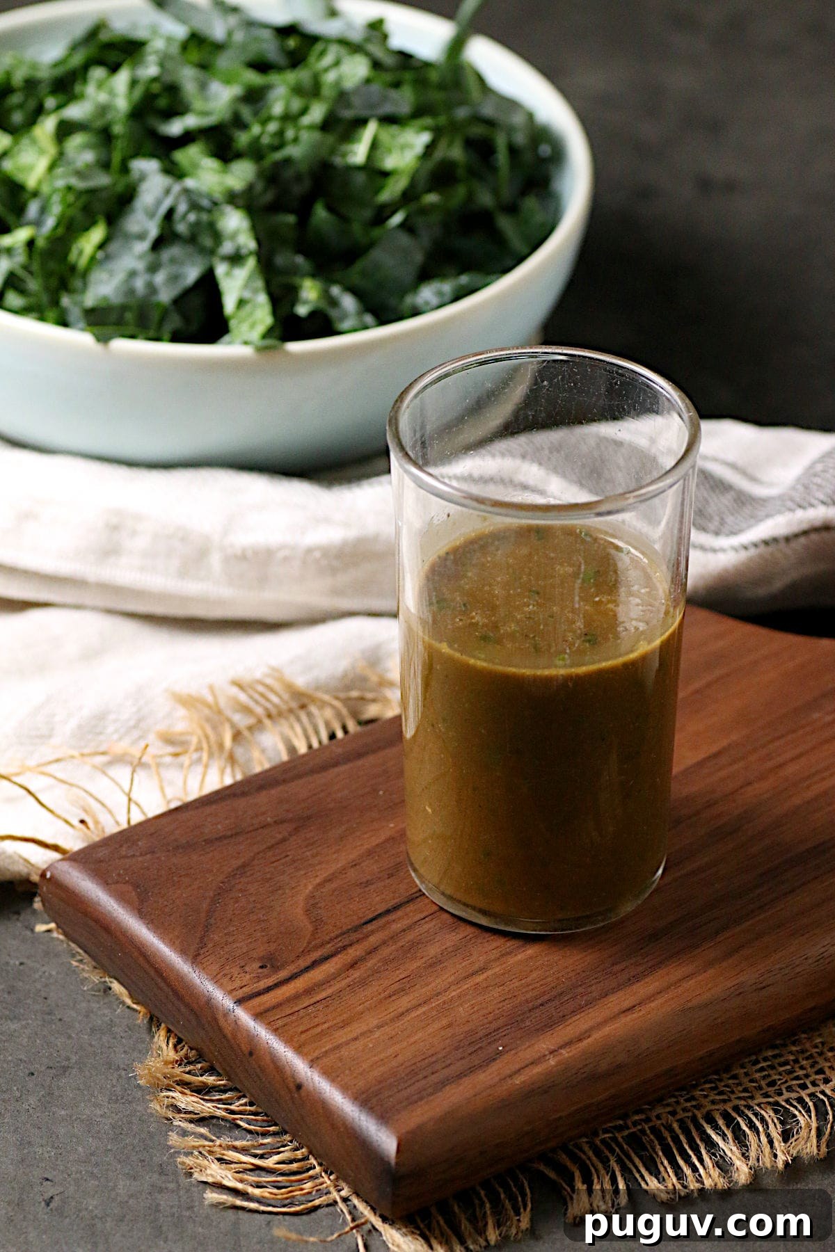 Basil Balsamic Vinaigrette Recipe — Tangy Herb Dressing for Salads 2 A glass jar of Basil Balsamic Vinaigrette.