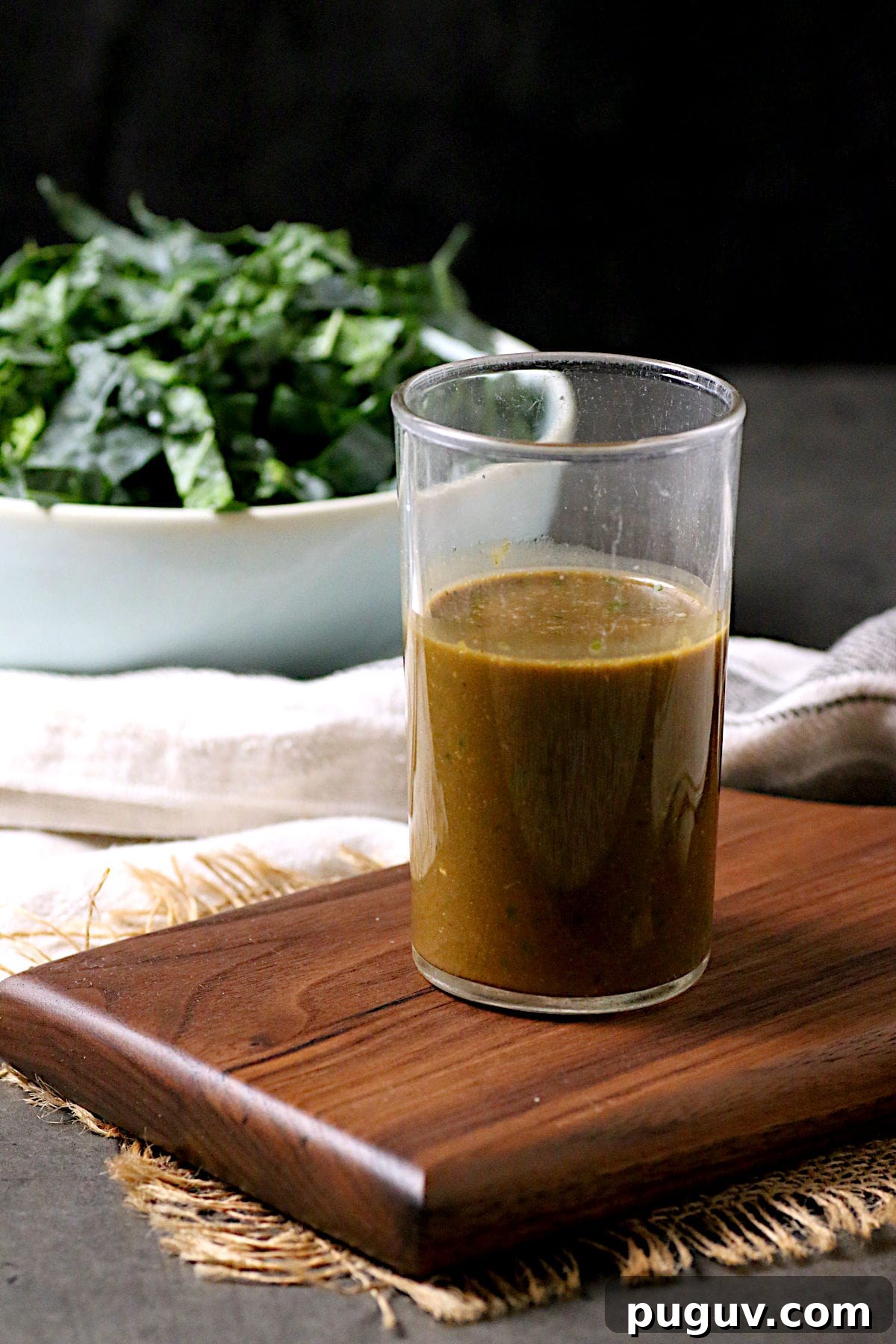 Basil Balsamic Vinaigrette Recipe — Tangy Herb Dressing for Salads 3 A glass jar of Basil Balsamic Vinaigrette.