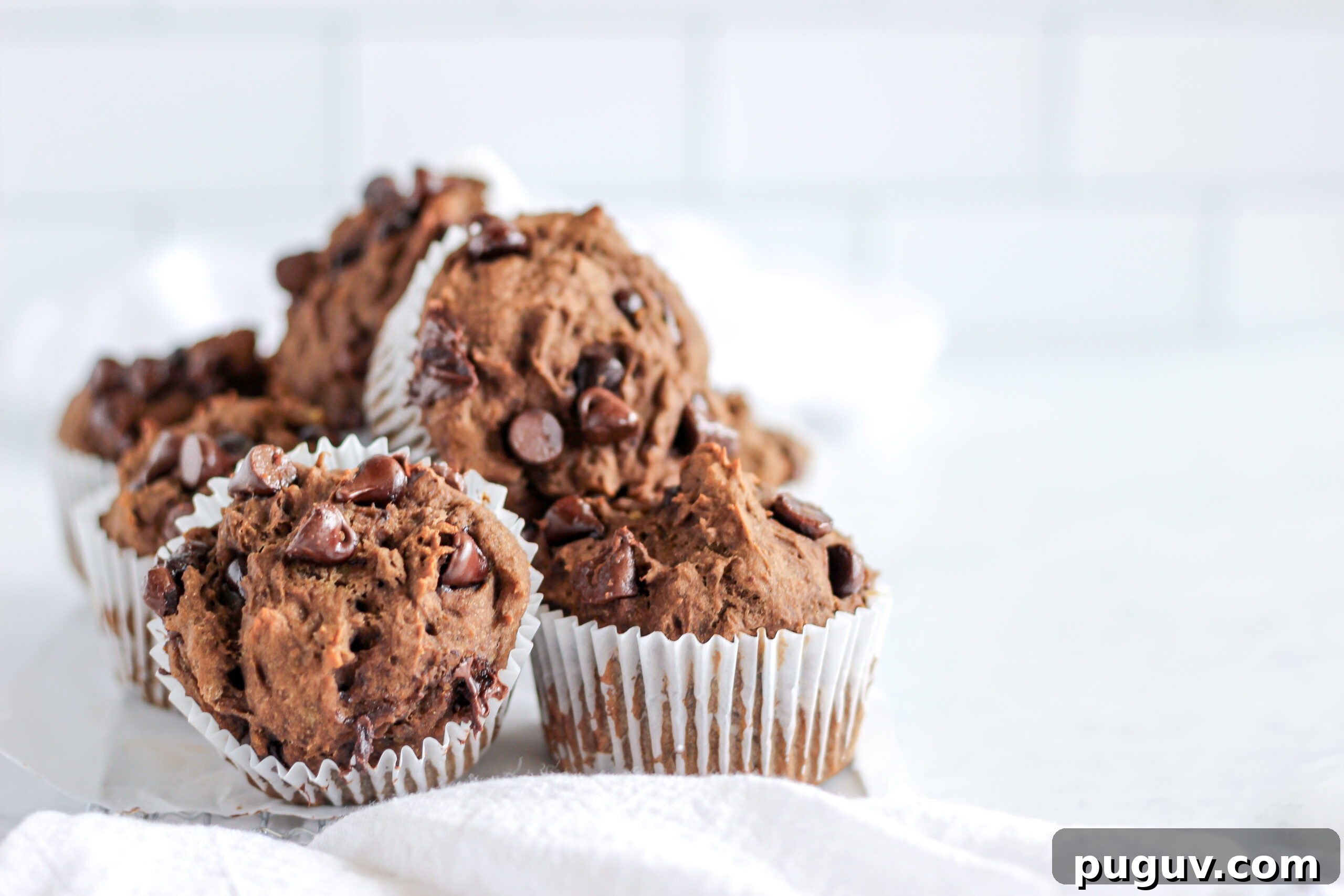 Double Chocolate Chip Banana Muffins — Gluten-Free Recipe 4 Muffins cooling