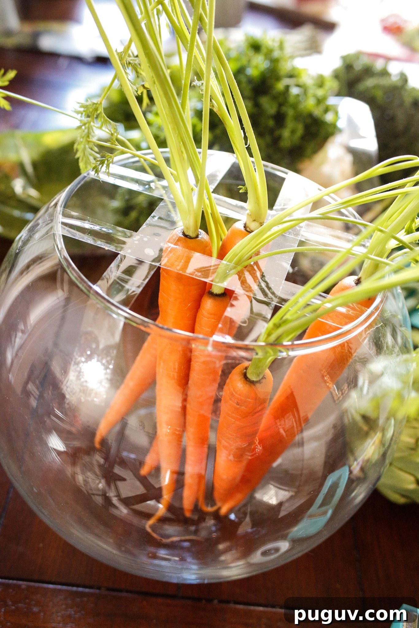 Create a Stunning Vegetable Floral Centerpiece for Any Table 6 Carrots arranged through tape grid