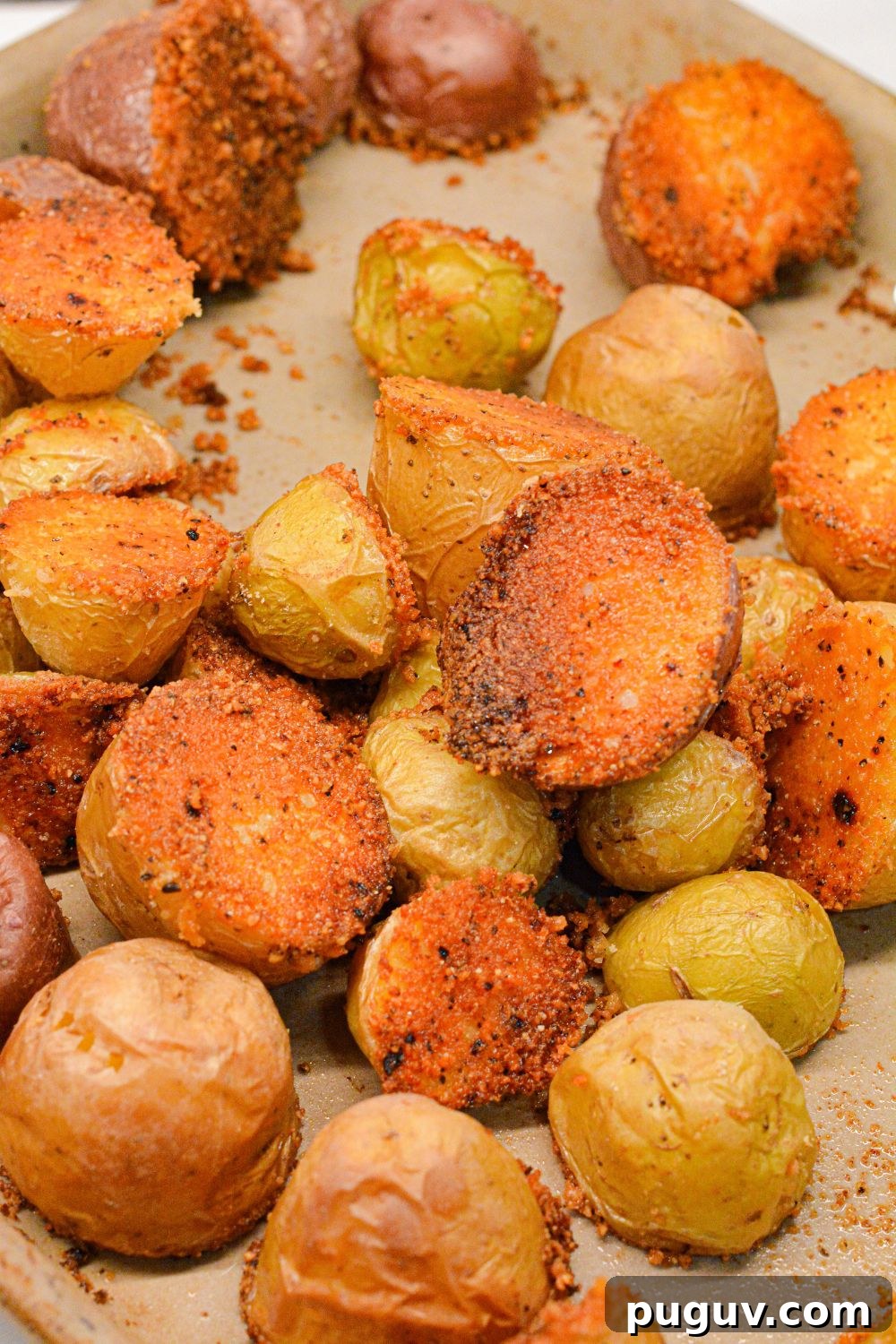Discover the ultimate Parmesan Crusted Potatoes recipe! Crispy, cheesy, and delicious, this easy-to-make side dish is perfect for any occasion. 