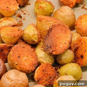 Discover the ultimate Parmesan Crusted Potatoes recipe! Crispy, cheesy, and delicious, this easy-to-make side dish is perfect for any occasion.