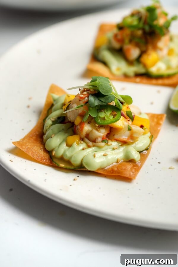 Juicy Beef Tenderloin Stacks with Garlic Herb Butter 4 Shrimp ceviche on top of avocado lime sauce with a crunchy wonton tostada.