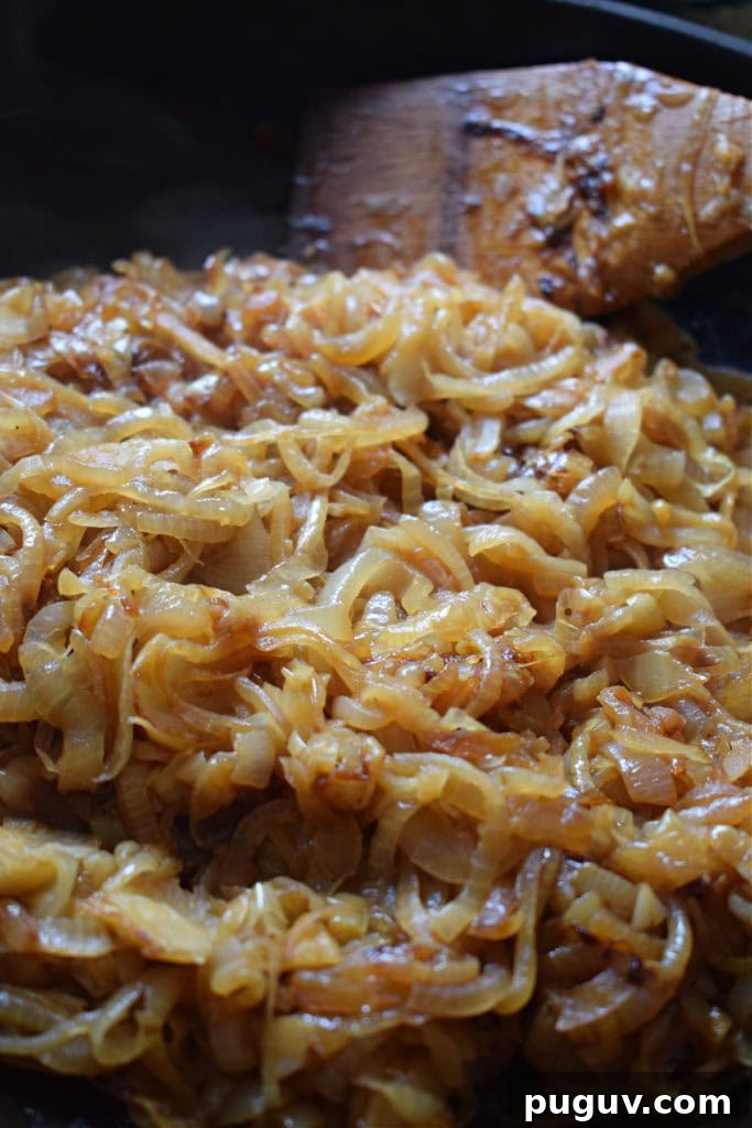 Perfect Guide to Caramelizing Onions for Sweet, Golden Flavor 11 caramelized onions in a skillet