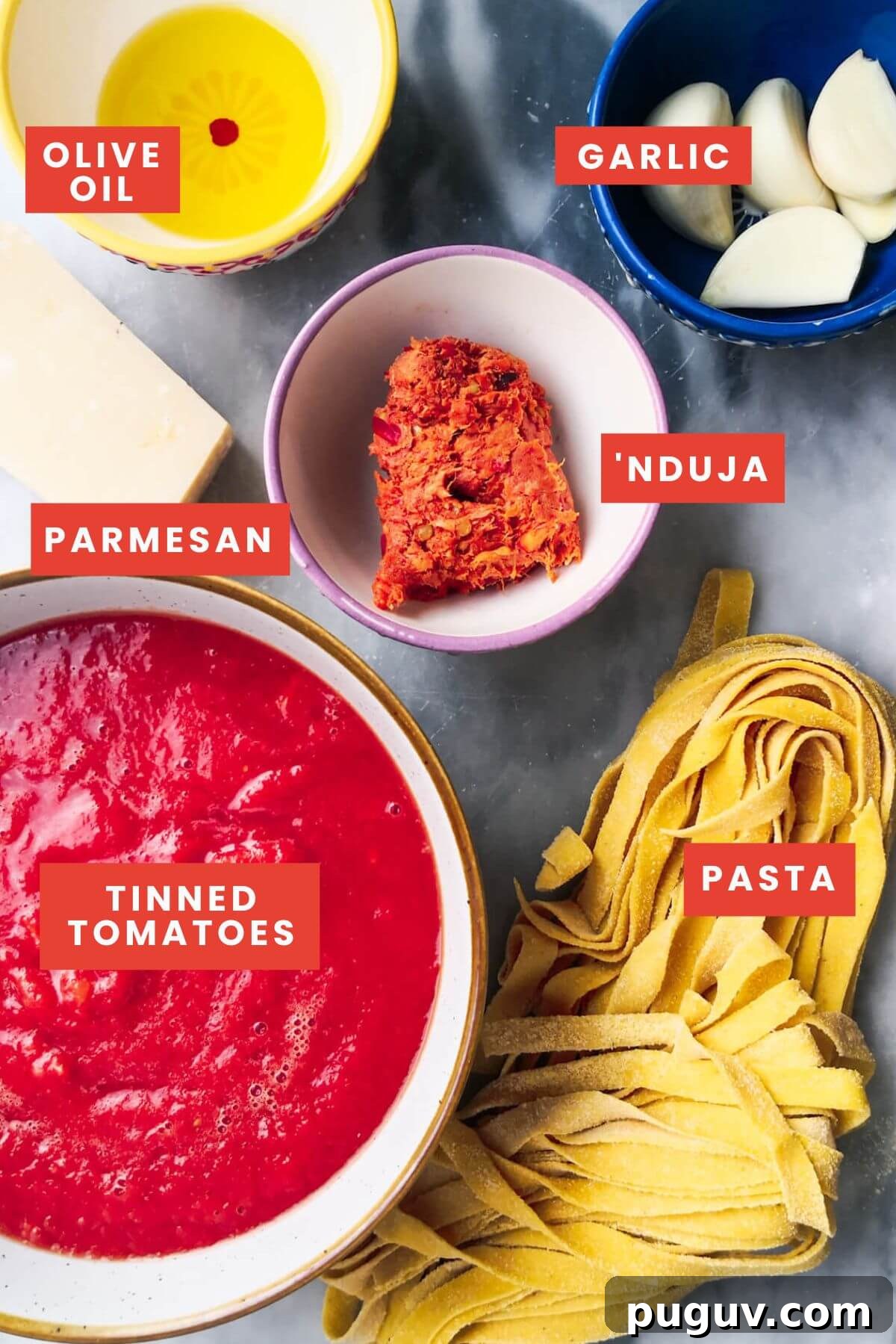 Spicy ’Nduja Pasta with Creamy Burrata Cheese 3 Ingredients for nduja pasta laid out on a grey marble background and labelled.