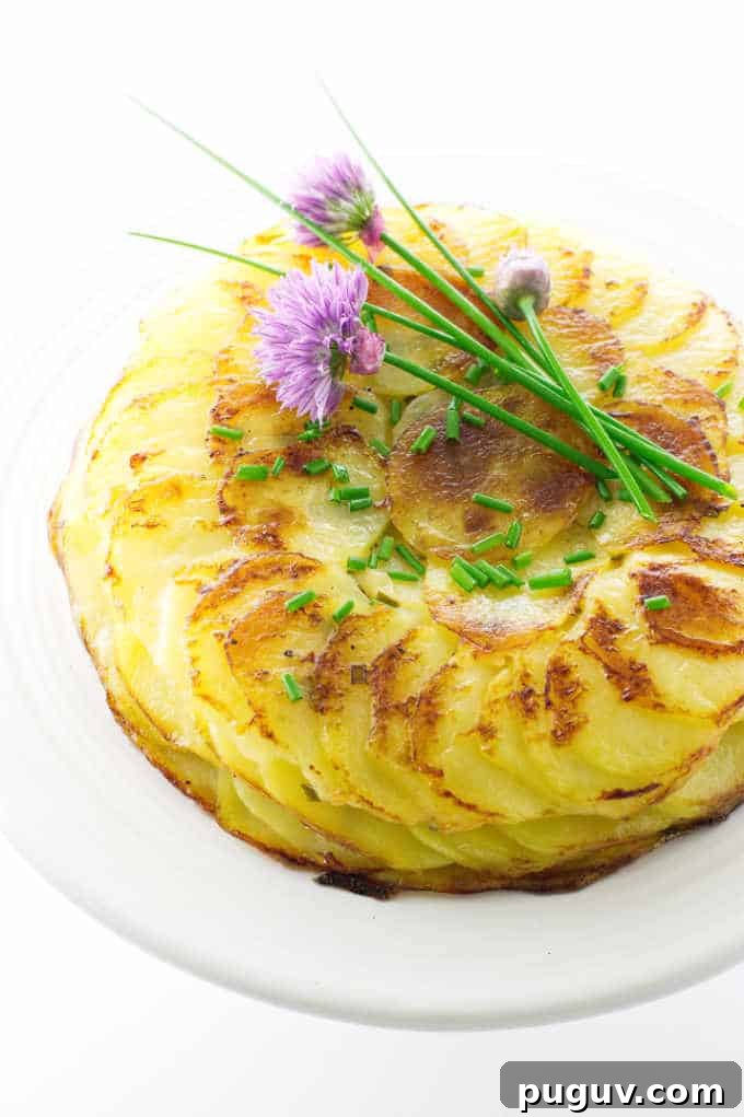 Chive blossoms on top of potatoes